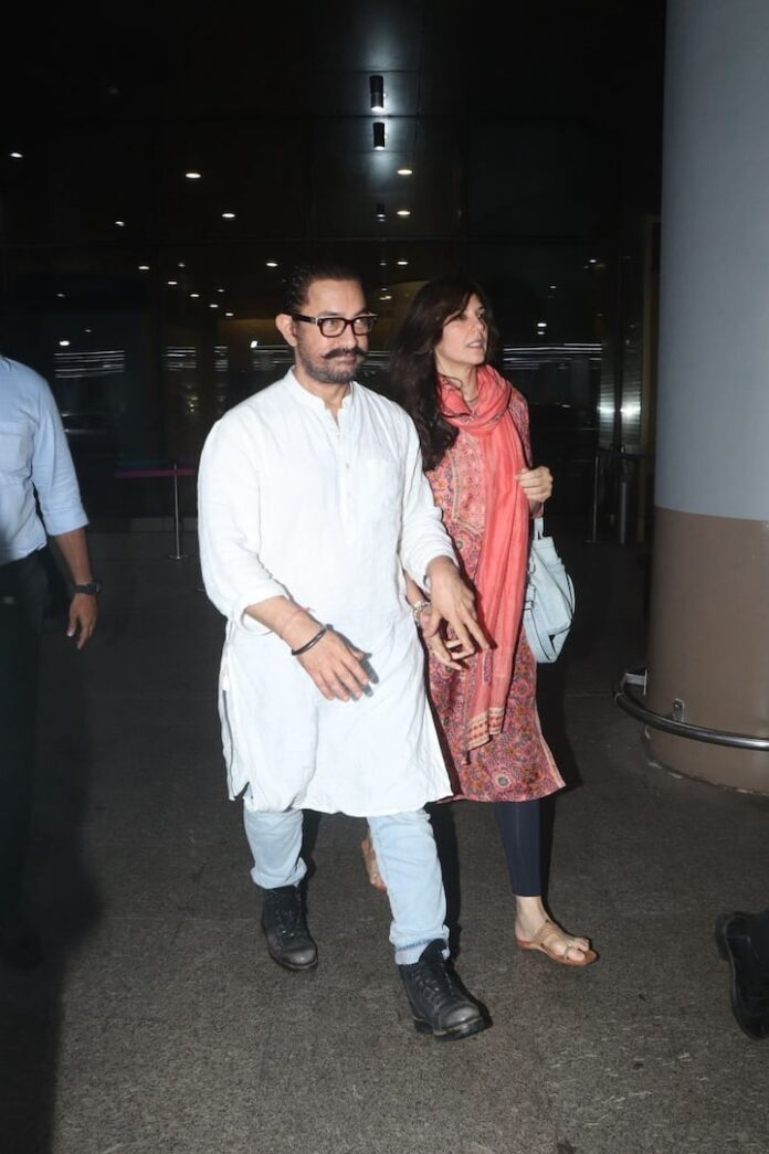 Aamir Khan and Gauri Spratt's Airport Appearance: A Glimpse of Their Happy Relationship